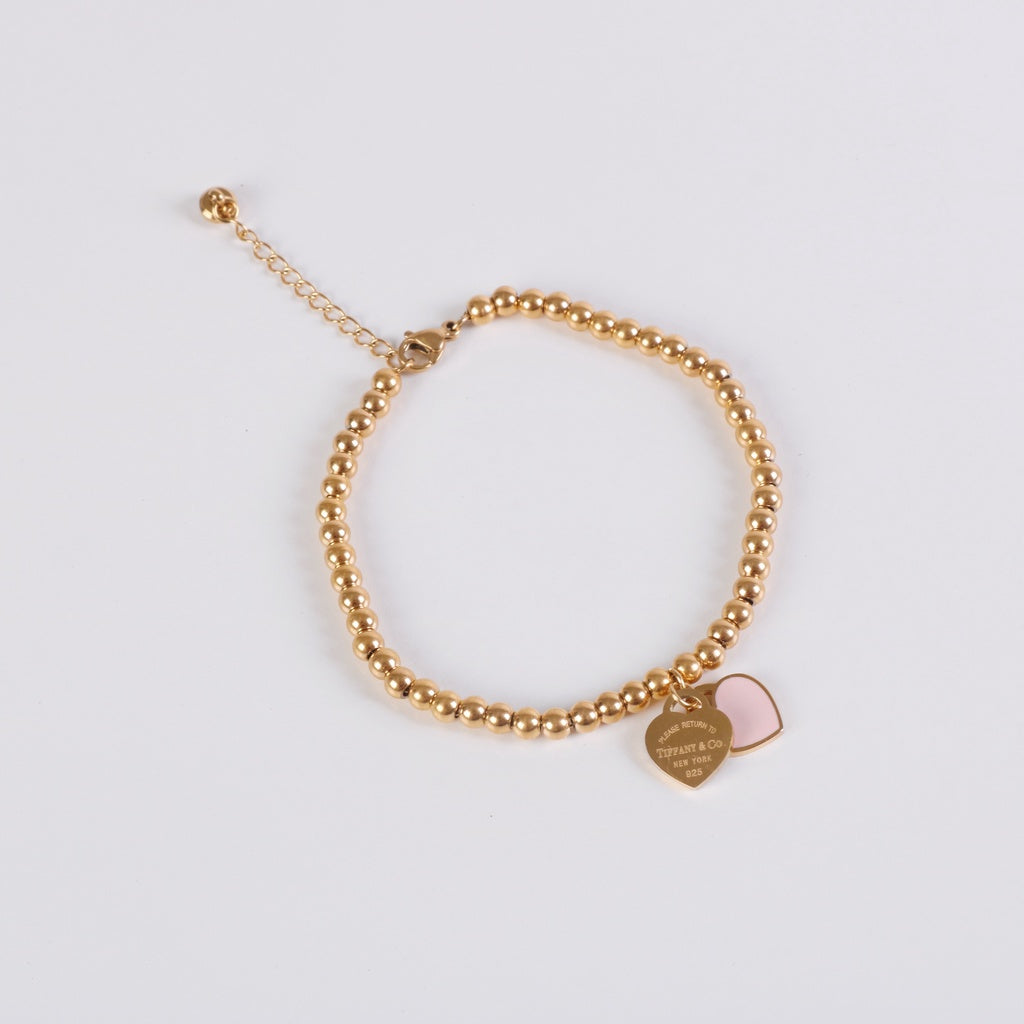 Woven Colombian Heart Stone Bracelet in Pinks main image 0