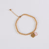 Pink gold beads bracelet with heart charm