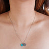 Teal heart necklace in white gold