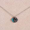 Teal heart necklace in white gold