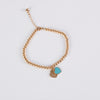 Teal gold beads bracelet with heart charm