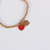 Red gold beads bracelet with heart charm