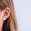 Mini clover earrings in pink