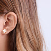 Mini clover earrings in white